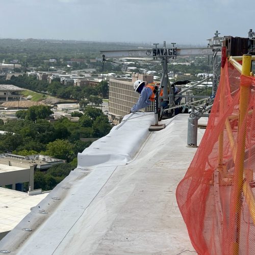 roofer-on-commercial-roof-texasjpg roofer-on-commercial-roof-texasjpg