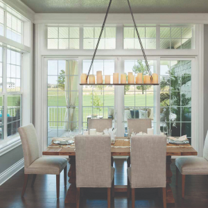 a nice dining room with walls of windows